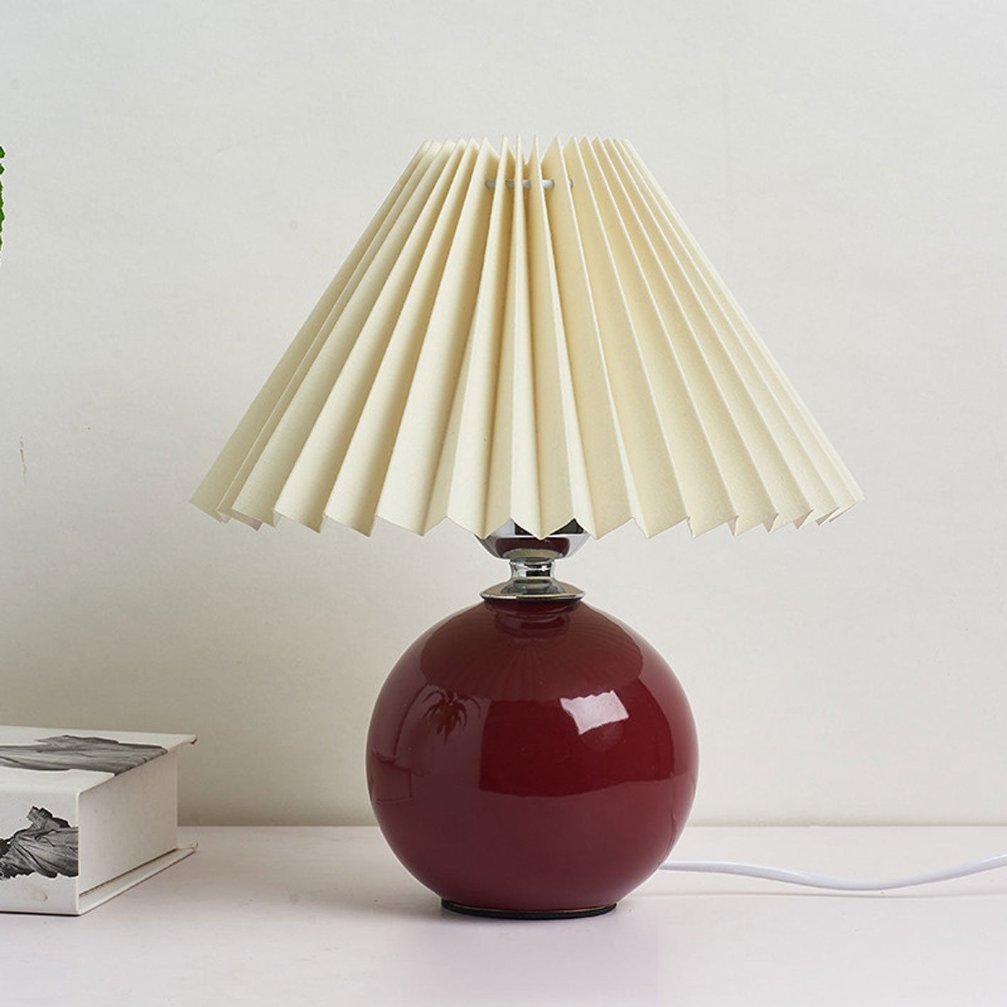 BowLift | Nordic minimalist 1-light table lamp made of ceramic with pleats