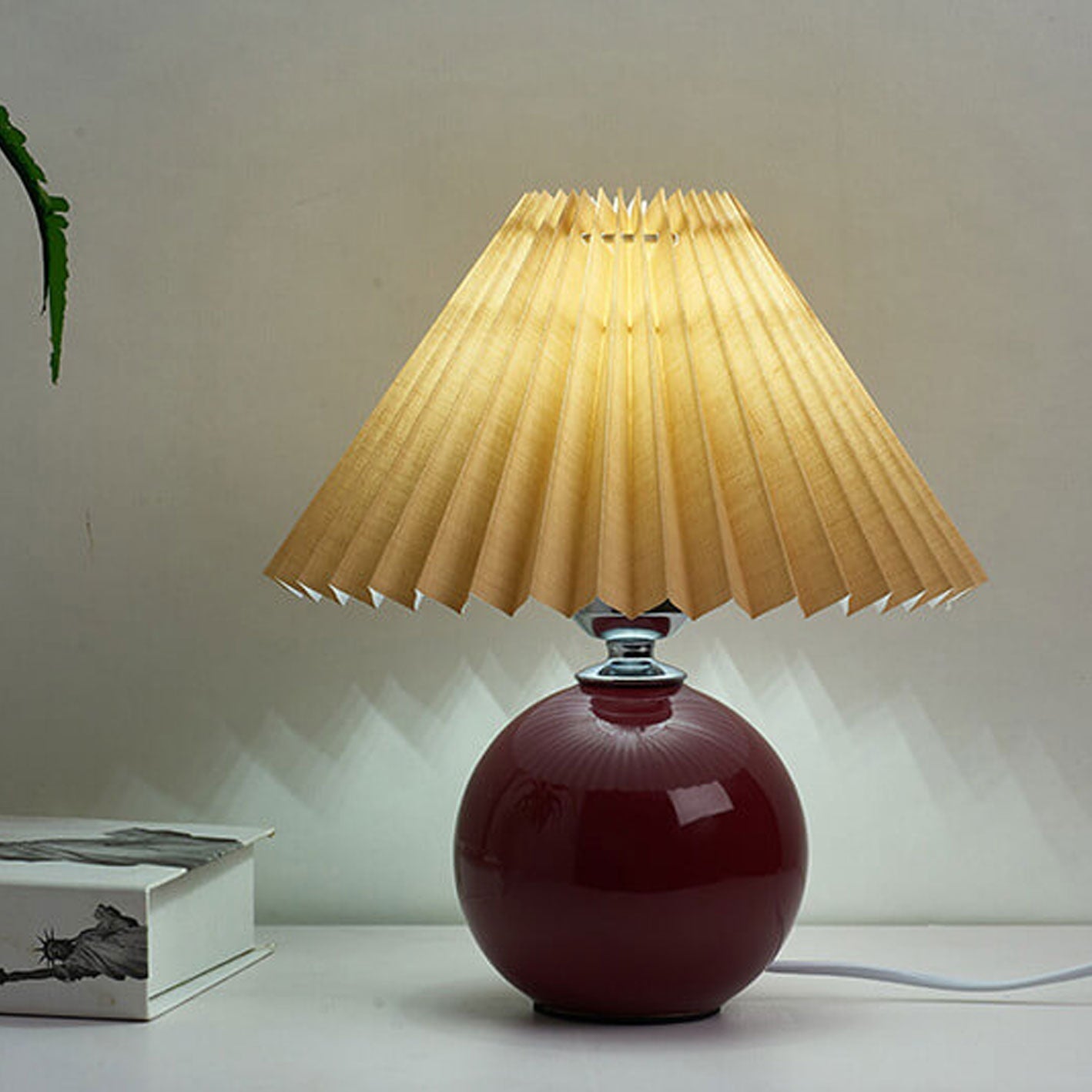 BowLift | Nordic minimalist 1-light table lamp made of ceramic with pleats