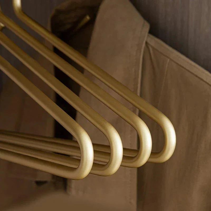BowLift | 5 pieces of hangers made of solid matte gold/silver │ Seamless wardrobe organizer made of metal