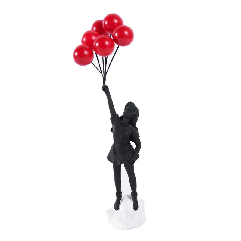 Skulptur eines Mädchen mit Ballon im Banksy-Stil für Tischdekoration und kreative Wohnzimmerdekoration