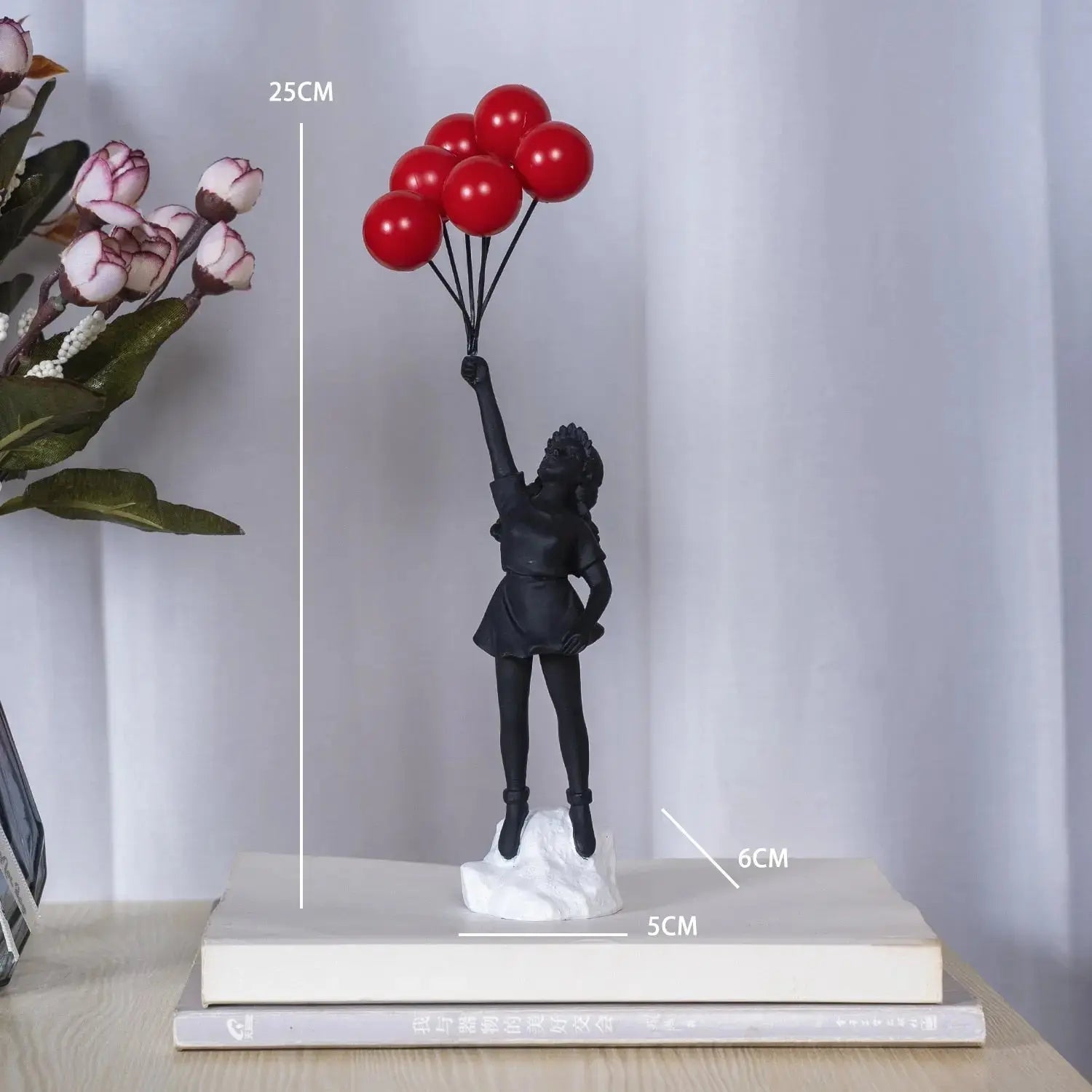 BowLift | Banksy flying Balloon Girl Statue