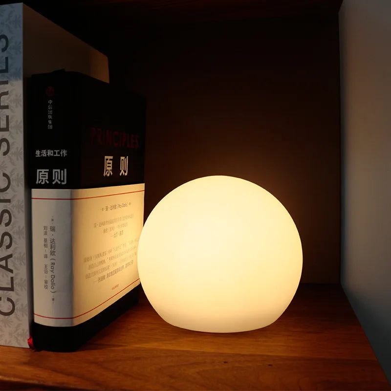 BowLift | GlowSphere – Table lamp with modern worldly charm