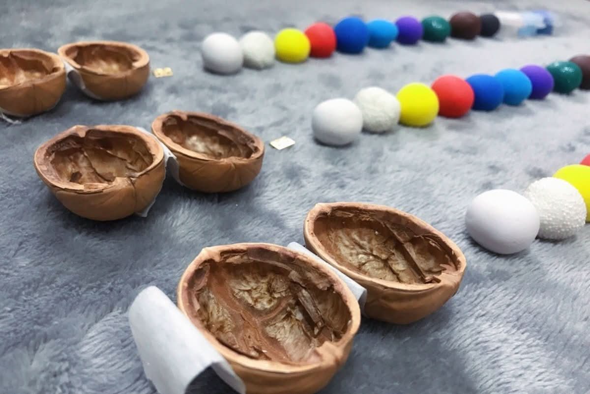 BowLift | Handmade dollhouse made from walnut shells with interior lighting