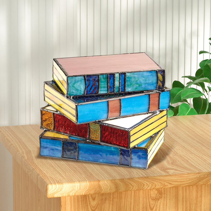 Lamp made of stacked books from stained glass | Bowlift