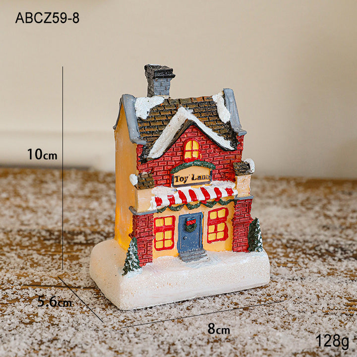 Illuminated Christmas house made of resin
