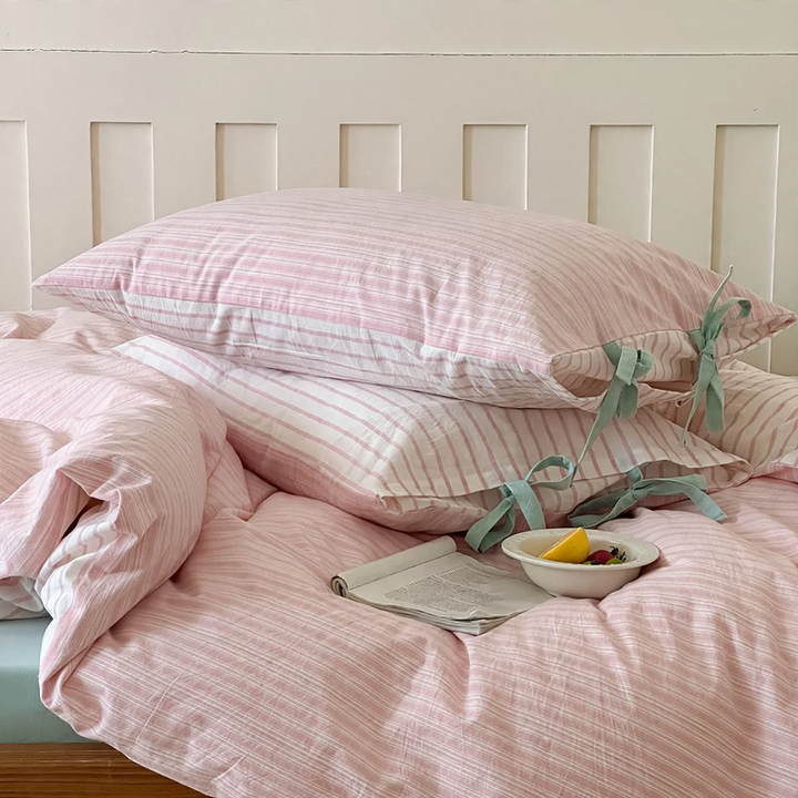 Cotton cushion cover with bow pattern