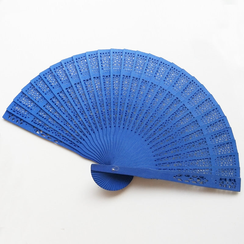 Ladies fan made of delicate plastic with artistic cut pattern Bowlift