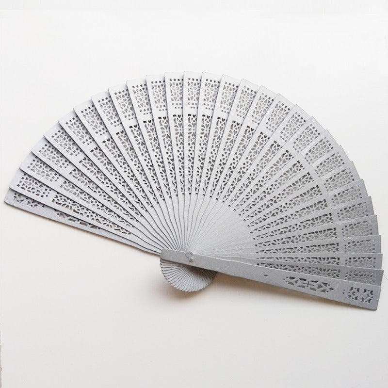 Ladies elegant fan made of high-quality plastic with artistic cutouts Bowlift