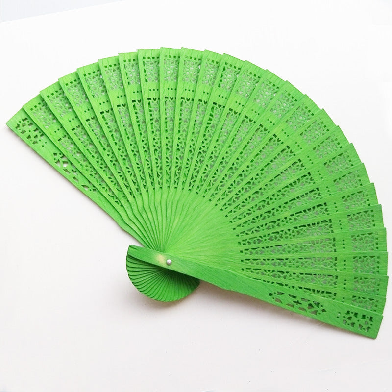 Ladies elegant fan made of high-quality plastic with artistic cutouts Bowlift