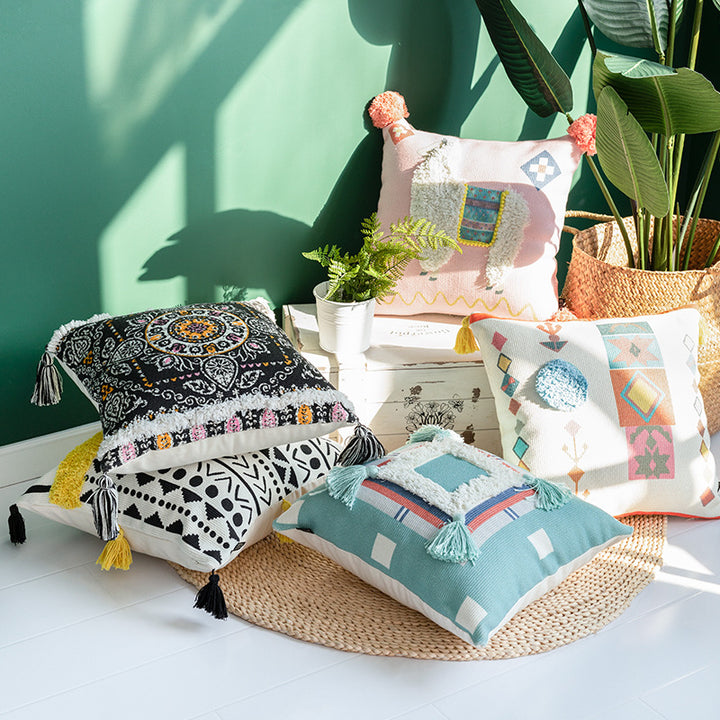 Square cushion cover with 3D alpaca appliqué, bouclé patch and pom-pom corners Bowlift