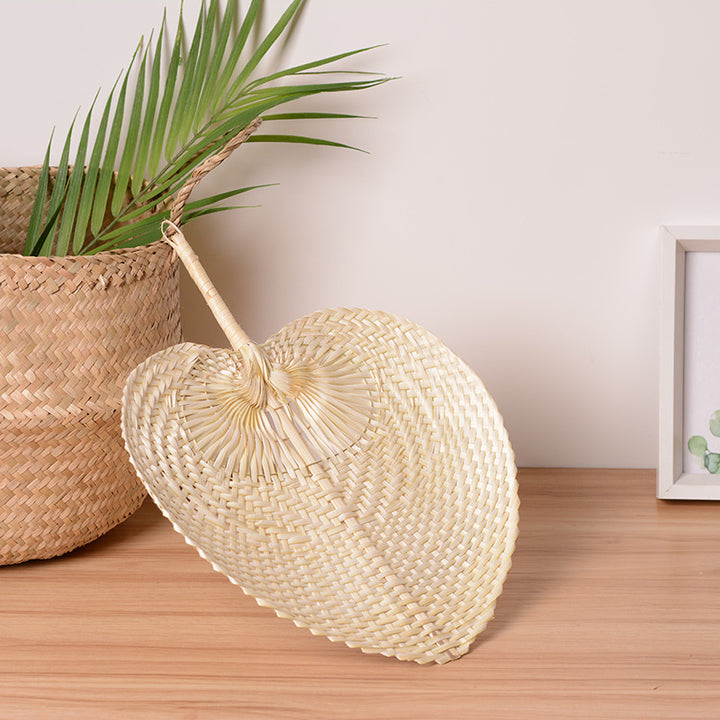 Handcrafted fan made from natural materials Bowlift