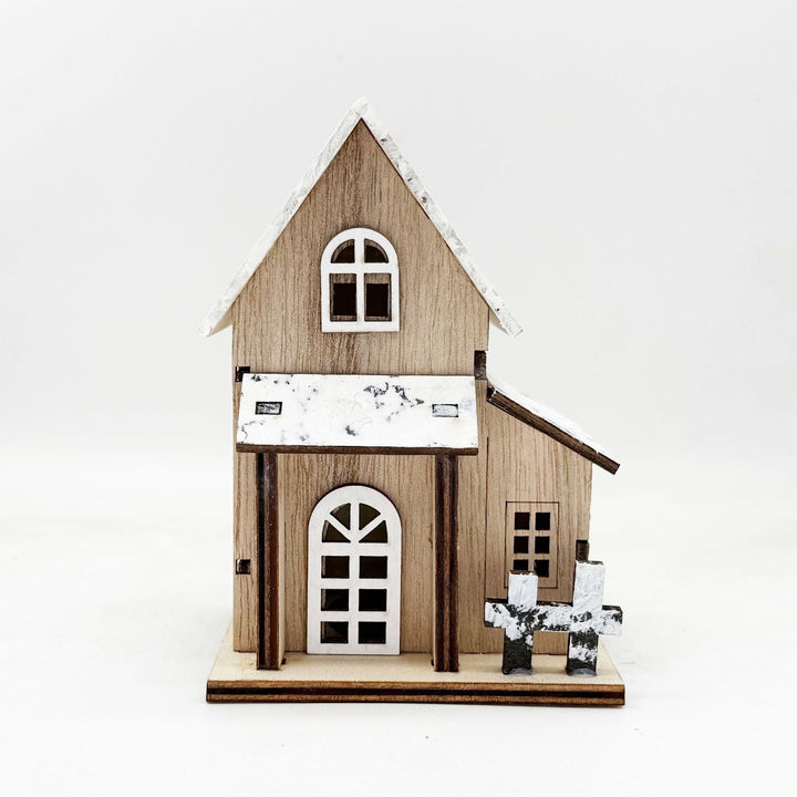Illuminated wooden Christmas house with LED