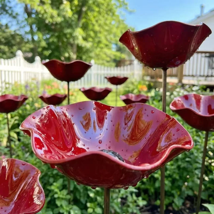 Decorative metal flower stake as a bird feeding station