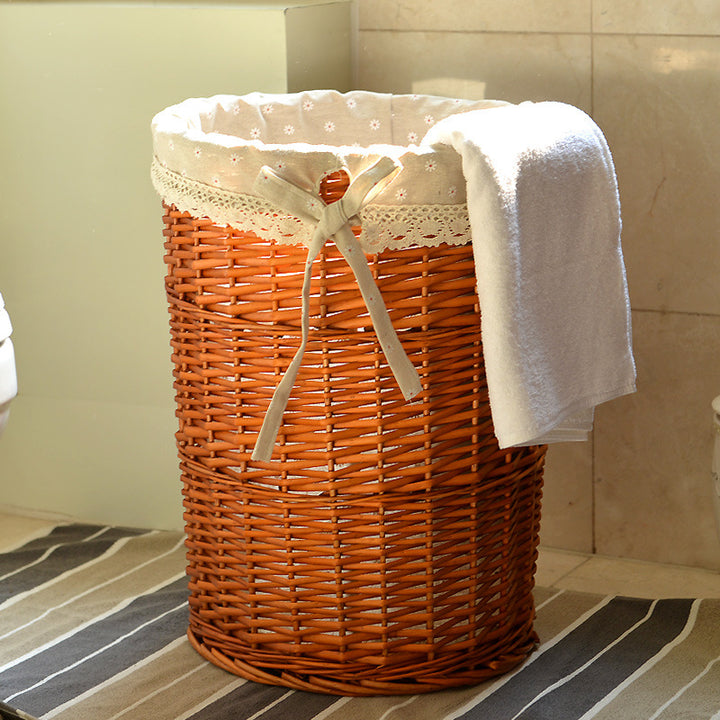 Women's laundry basket made of woven natural material with decorative fabric lining Bowlift