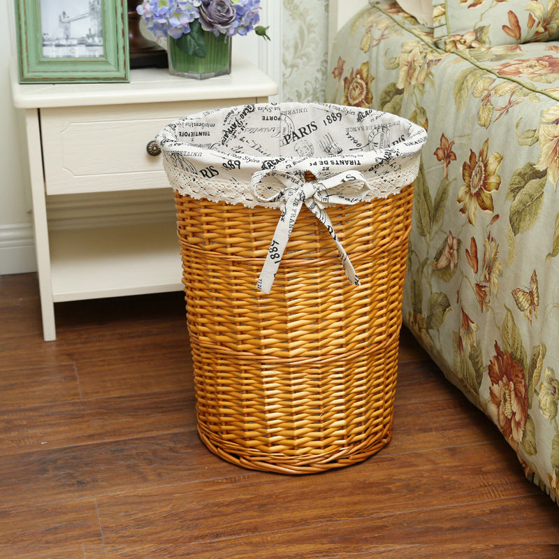 Women's laundry basket with decorative fabric lining and practical carrying handle Bowlift