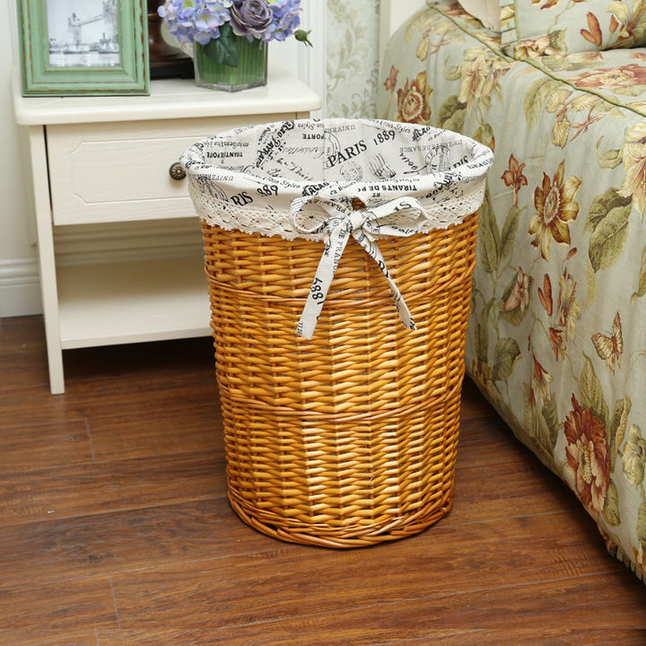 Women's laundry basket with decorative fabric lining and practical carrying handle Bowlift