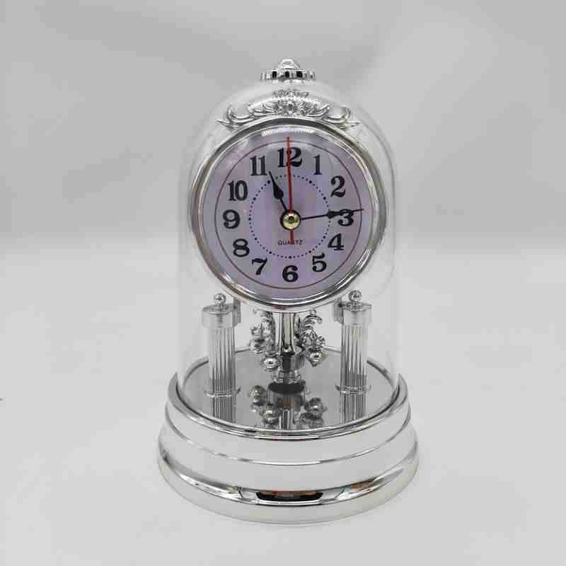 Classic table clock in elegant glass case Bowlift