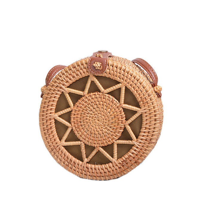 Elegant round handbag made of woven rattan Bowlift