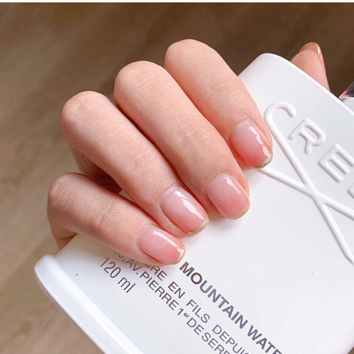Artificial nails with glitter accents and natural finish Bowlift