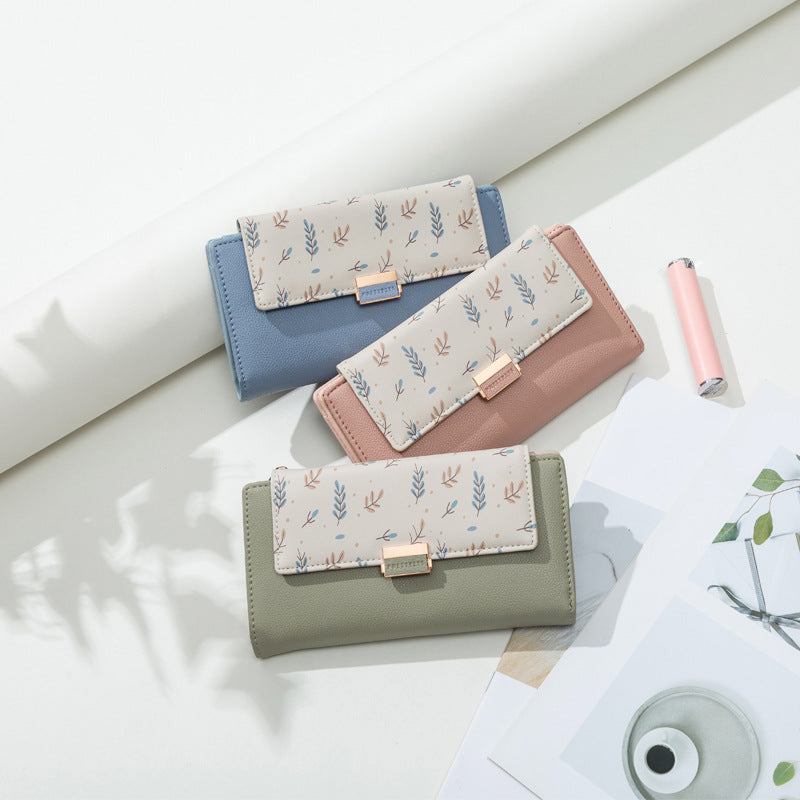Continental floral print faux leather long wallet with organized card and coin compartments Bowlift