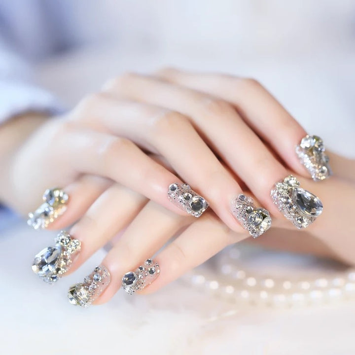 Nail art with glamorous rhinestone and glitter design Bowlift