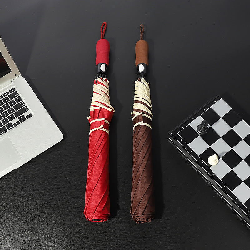 Women's automatic folding umbrella with ergonomic wooden handle Bowlift