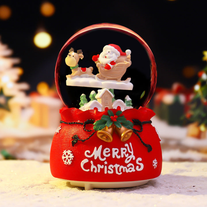 Illuminated snow globe with music and snow effect