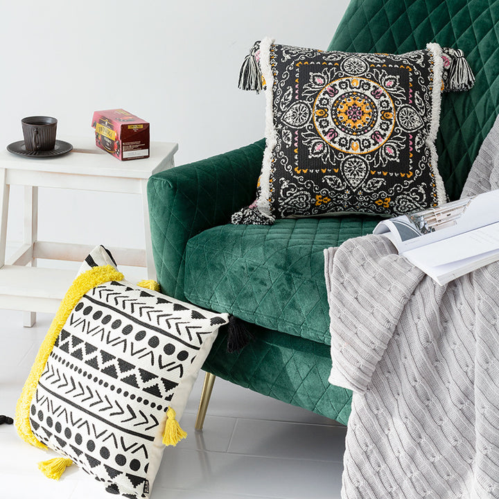 Square Boho decorative pillow with crocheted pom-pom and decorative corner tassels