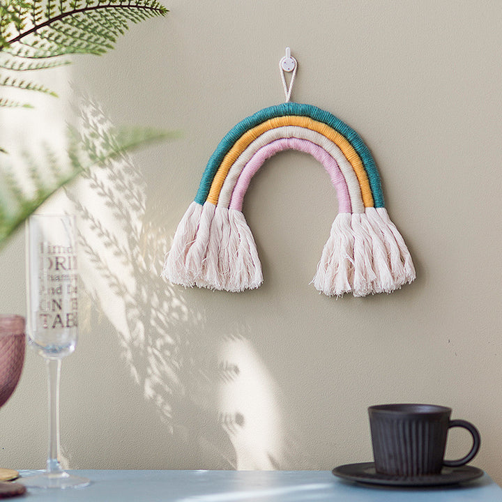 Macrame wall hanging in rainbow shape, handcrafted cotton yarn decorative element Bowlift
