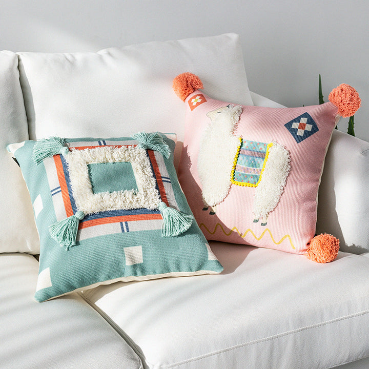 Square Boho decorative pillow with crocheted pom-pom and decorative corner tassels