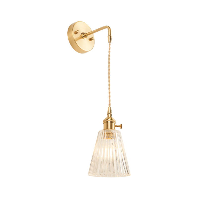 BowLift | A wall light with a bulb and conical shade made of clear, textured glass, industrial bedroom wall light fixture