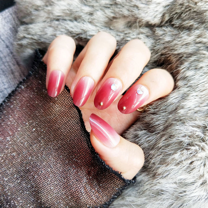 Artificial nails with elegant ombre effect and rhinestone decorations Bowlift