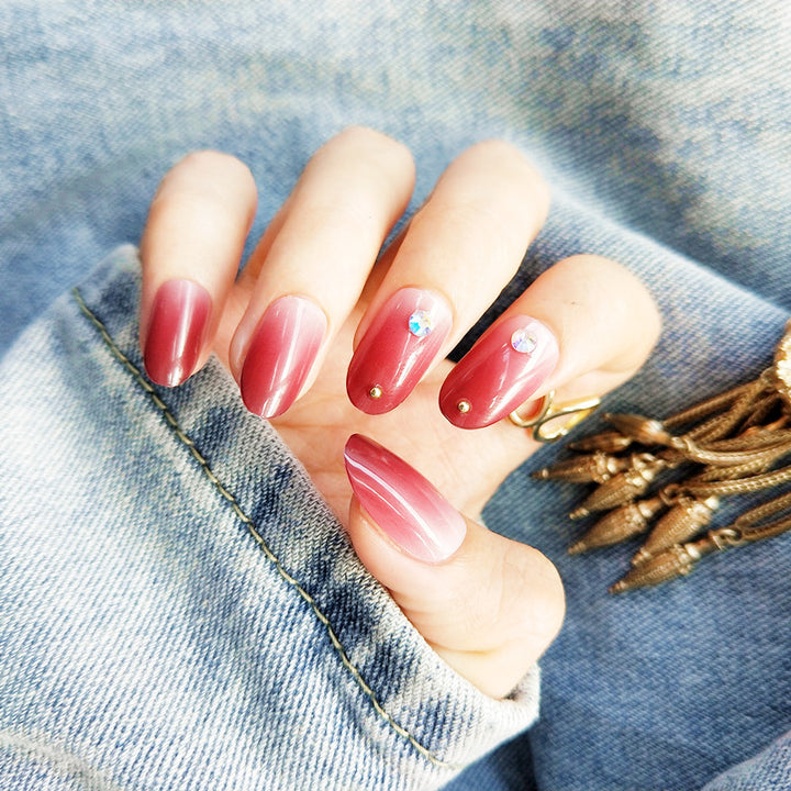 Artificial nails with elegant ombre effect and rhinestone decorations Bowlift