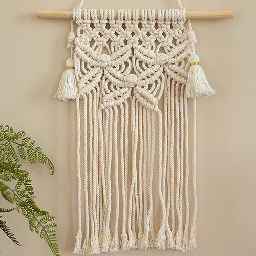 Macramé wall hanging with geometric triple tassel design and wooden rod Bowlift