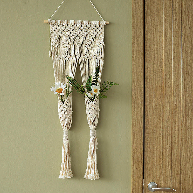 Macramé wall hanging with geometric triple tassel design and wooden rod Bowlift