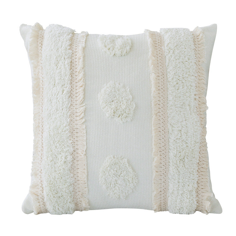 Decorative cushion cover with hand-tufted texture and fringe application
