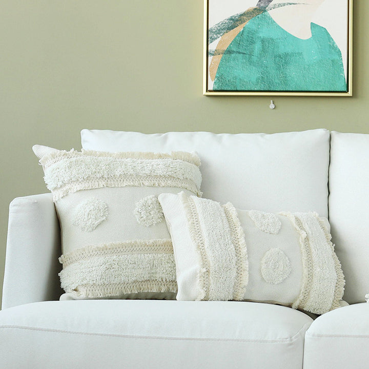 Decorative cushion cover with hand-tufted texture and fringe application