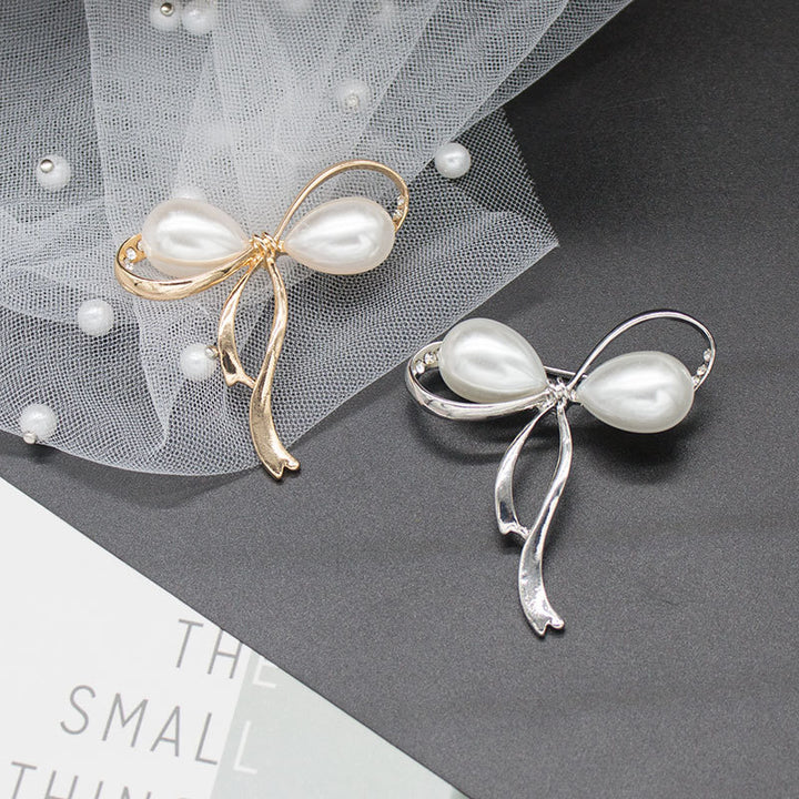 Elegant Pearl Bow Brooch Bowlift