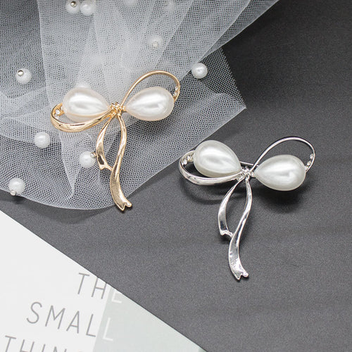 Elegant Pearl Bow Brooch Bowlift