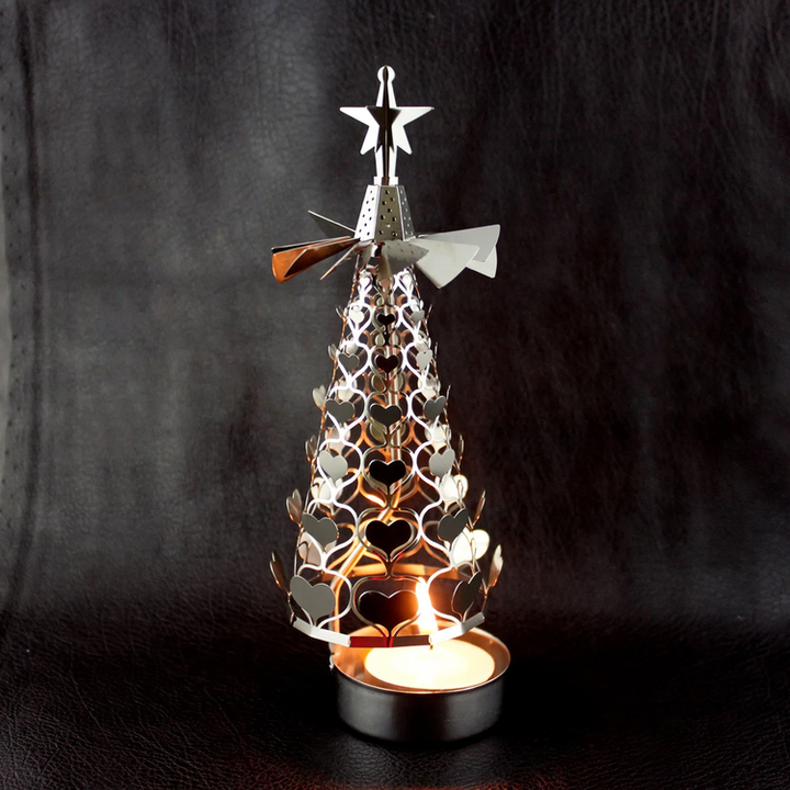 Rotating candle holder made of copper