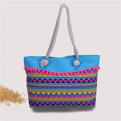Large beach bag with crocheted embellishments Bowlift