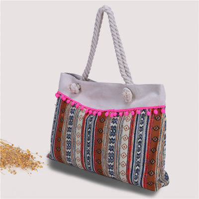 Large beach bag with crocheted embellishments Bowlift