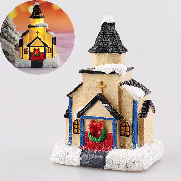 Illuminated miniature Christmas house made of resin