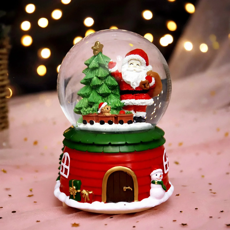 Christmas music box with snow globe and light