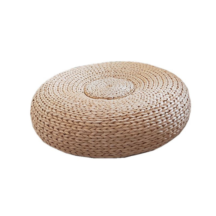 Handcrafted sitting pouf made of natural material Bowlift