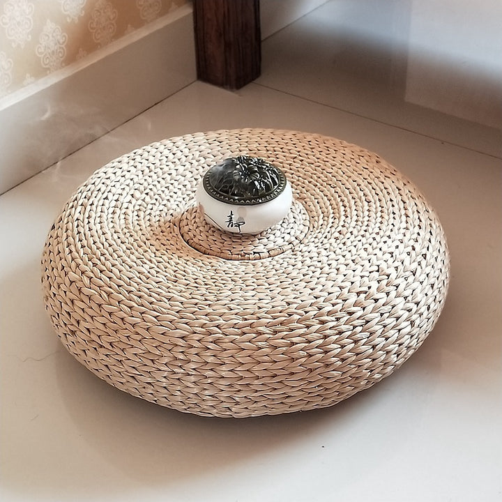 Handcrafted sitting pouf made of natural material Bowlift