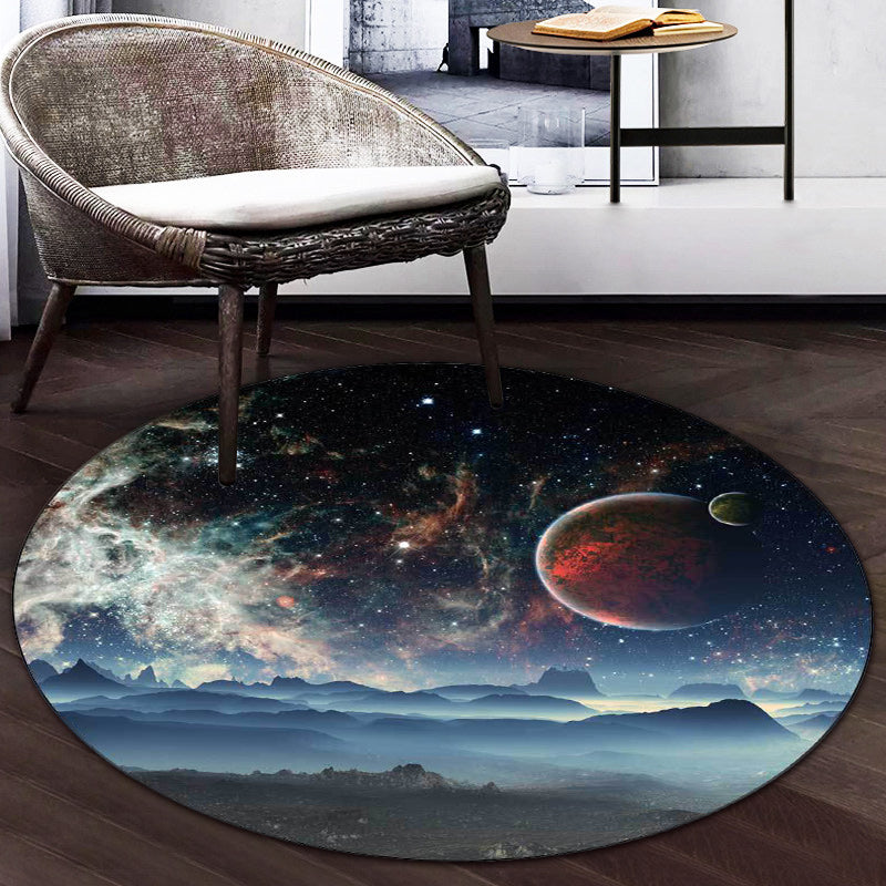 Simple modern rug in blue and black with pattern of hilly landscapes in space for home decoration, made of polyester, washable | Bowlift