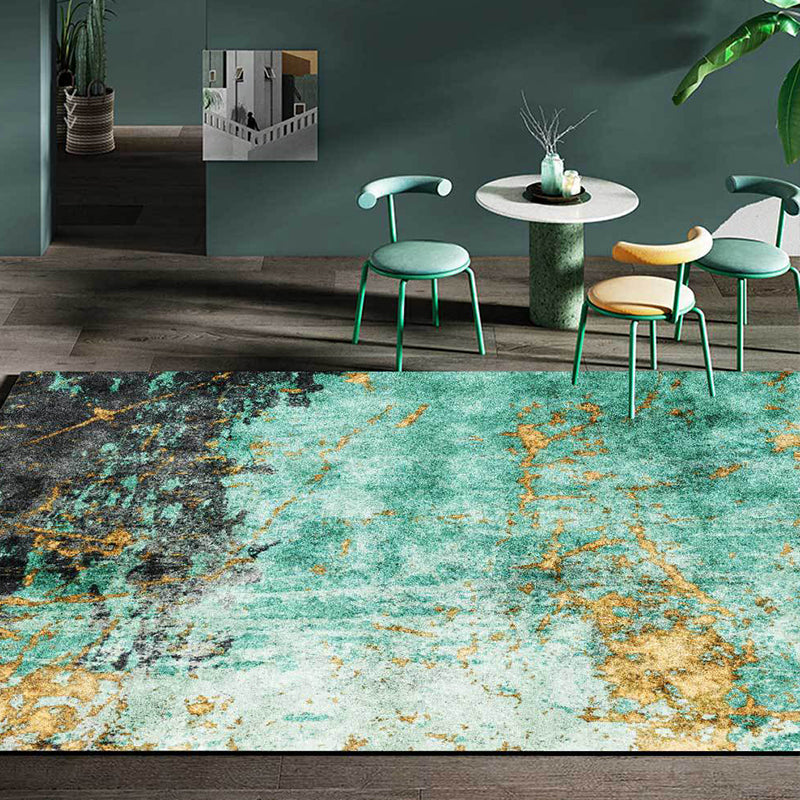Stylish abstract rug in green and gold, Nordic rug made of polyester, washable, non-slip backing, living room rug. | Bowlift
