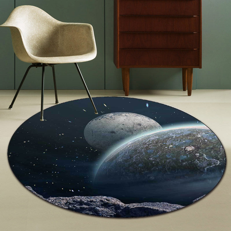 Modern living room rug in blue and black with planet print of outer space Rug polyester pet-friendly machine washable rug | Bowlift