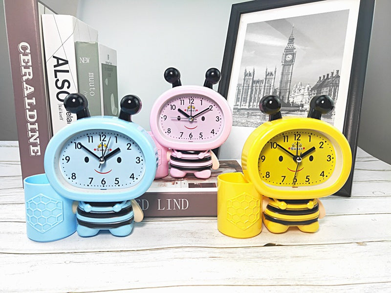 Alarm clock and pen holder Bowlift